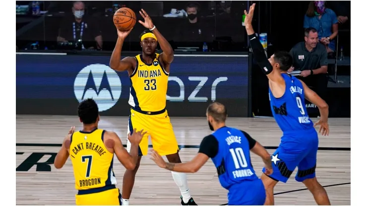 Myles Turner & Malcolm Brogdon vs. Evan Fournier and Nikola Vucevic. (Getty)