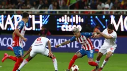 Chivas' Uriel Antuna (left) and Toluca's Michael Estrada (Getty).