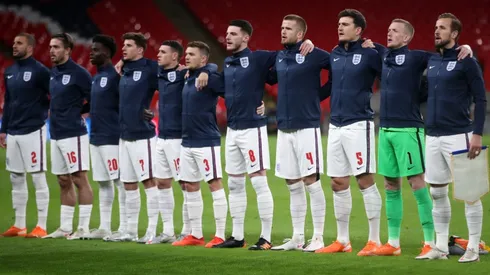 The England team line up for the national anthem against Iceland. (GEtty)