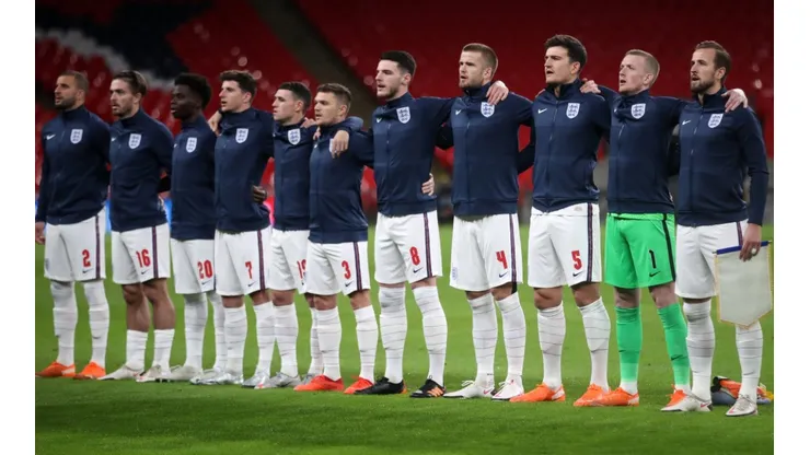 The England team line up for the national anthem against Iceland. (GEtty)