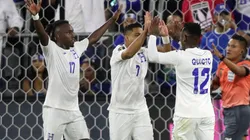 Alberth Elis (left) and Romell Quioto (right) react after a goal by Emilio Izaguirre (centre) of Honduras. (Getty)