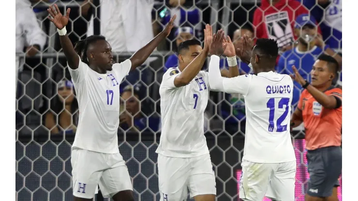 Alberth Elis (left) and Romell Quioto (right) react after a goal by Emilio Izaguirre (centre) of Honduras. (Getty)