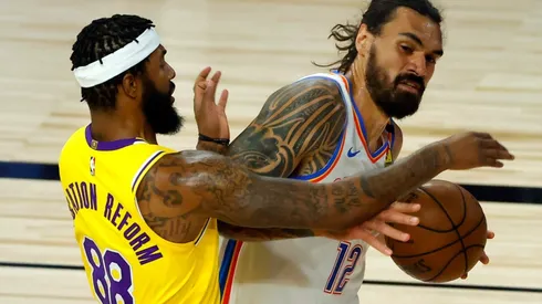 Steven Adams of the Oklahoma City Thunder (right) is defended by Markieff Morris of the Los Angeles Lakers (left). (Getty)