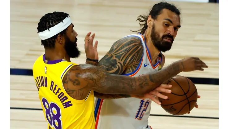 Steven Adams of the Oklahoma City Thunder (right) is defended by Markieff Morris of the Los Angeles Lakers (left). (Getty)