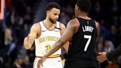Stephen Curry of the Golden State Warriors (left) shakes hands with Kyle Lowry of the Toronto Raptors (left). (Getty).jpg