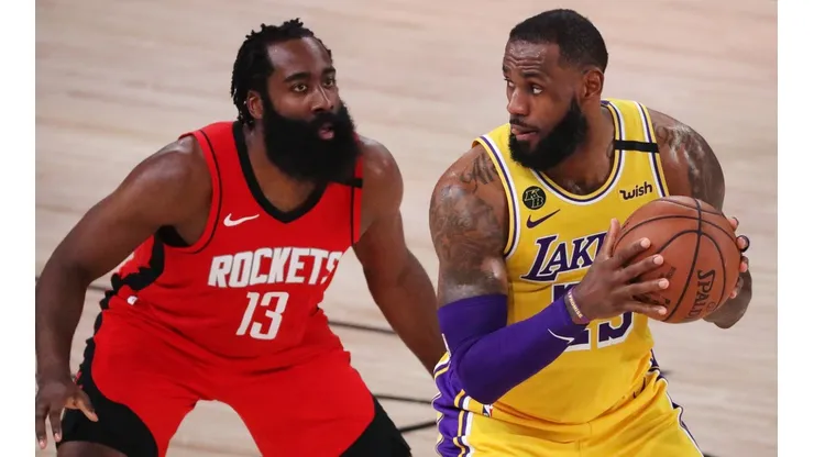 LeBron James of the Los Angeles Lakers (left) drives the ball against James Harden of the Houston Rockets (right). (Getty).jpg