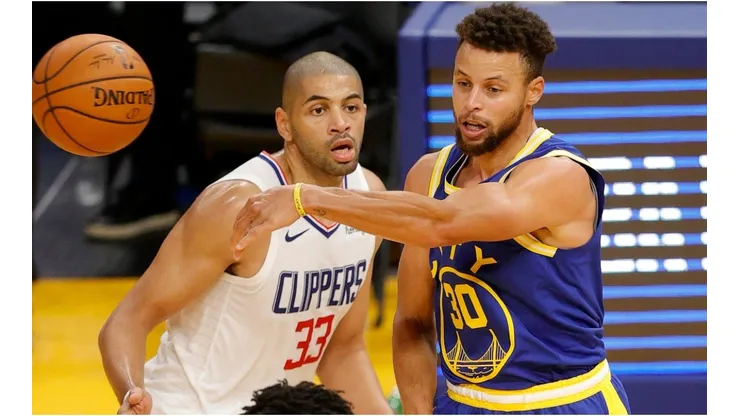 Stephen Curry & Nicolas Batum. (Getty)