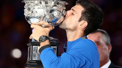 Novak Djokovic of Serbia kisses the trophy at the 2019 Australian Open. (Getty)