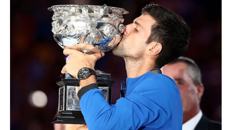 Novak Djokovic of Serbia kisses the trophy at the 2019 Australian Open. (Getty)