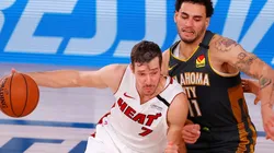 Goran Dragic (left) of the Miami Heat drives against Abdel Nader (right) of the Oklahoma City Thunder. (Getty)