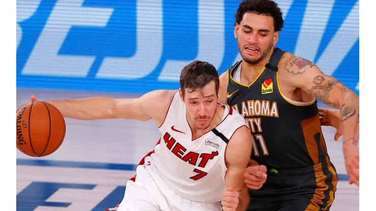 Goran Dragic (left) of the Miami Heat drives against Abdel Nader (right) of the Oklahoma City Thunder. (Getty)