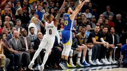 Damian Lillard guarding Stephen Curry. (Getty)