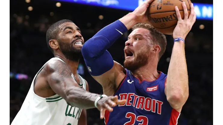 Kyrie Irving (left) of the Boston Celtics defends Blake Griffin (right) of the Detroit Pistons. (Getty)