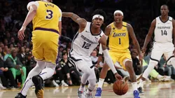 Ja Morant (centre) of the Memphis Grizzlies dribbles the ball against the Los Angeles Lakers. (Getty)