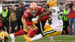 Deebo Samuel (left of the San Francisco 49ers runs over Darnell Savage (right) of the Green Bay Packers. (Getty)