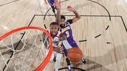 Damian Lillard scoring over Anthony Davis. (Getty)