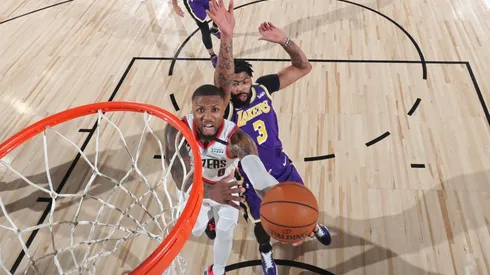 Damian Lillard scoring over Anthony Davis. (Getty)