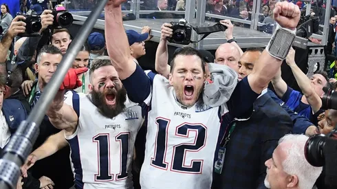 Julian Edelman (left) of the New England Patriots and teammate Tom Brady (right) celebrate at the end of the Super Bowl 2019. (Getty)