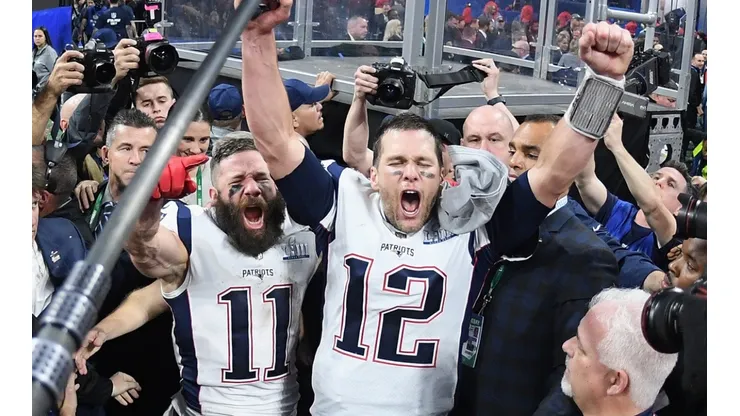 Julian Edelman (left) of the New England Patriots and teammate Tom Brady (right) celebrate at the end of the Super Bowl 2019. (Getty)