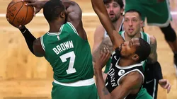 Jaylen Brown tries to score against Kevin Durant. (Getty)
