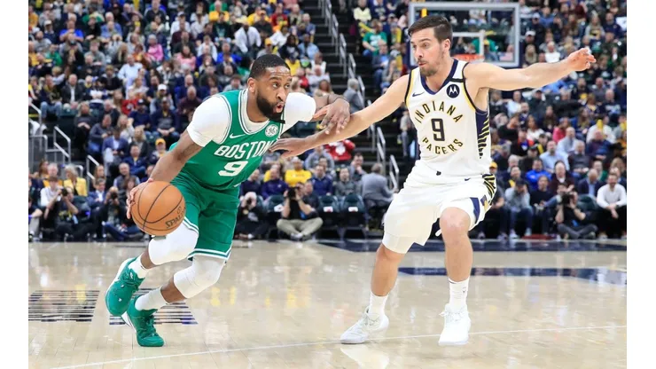 Brad Wanamaker (left) of the Boston Celtics dribbles the ball against the Indiana Pacers. (Getty)
