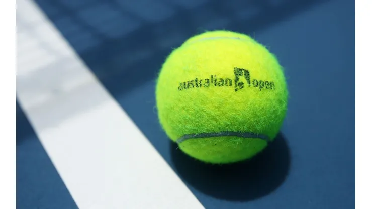 An Australian Open branded tennis ball is seen on court. (Getty)