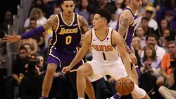 Kyle Kuzma guarding Devin Booker. (Getty)