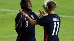 Ayo Akinola and Chris Mueller celebrate during USMNT's 6-0 win over El Salvador. (Getty)