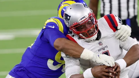 Aaron Donald sacking Cam Newton. (Getty)