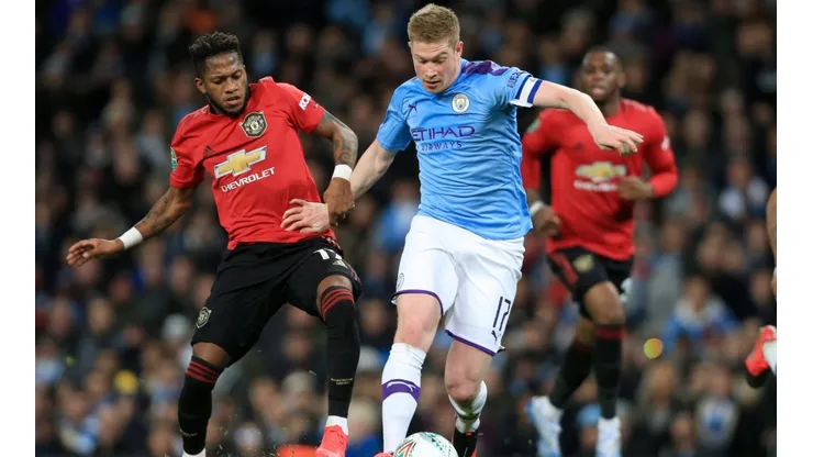 Fred of Manchester United (left) battles with Kevin de Bruyne of Manchester City (right). (Getty)