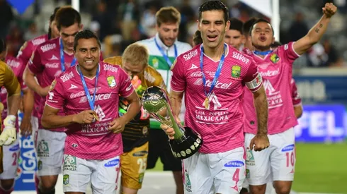 Rafa Márquez and León celebrating the title. (Getty)