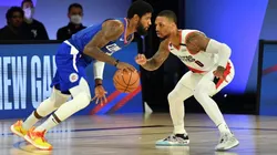 Damian Lillard guarding Paul George. (Getty)