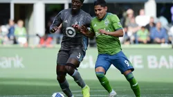 Seattle Sounders forward Raúl Ruidíaz (right) and Minnesota United defender Ike Opara battle for the ball (Getty).