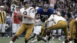 Sonny Jurgensen of the Washington Redskins trying to avoid a sack. (Getty)