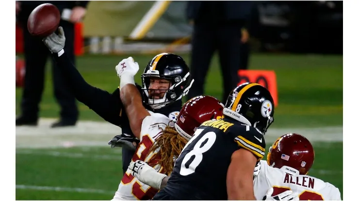 Ben Roethlisberger was under heavy pressure all night. (Getty)