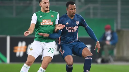 Gabriel of Arsenal (right) challenged by Ercan Kara of Rapid Wien (left). (Getty)