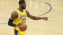 LeBron James running the offense. (Getty)