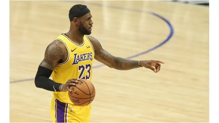 LeBron James running the offense. (Getty)