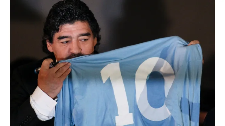 Diego Maradona kissing the Napoli soccer jersey (Getty).
