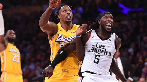 Montrezl Harrell boxing out Dwight Howard. (Getty)