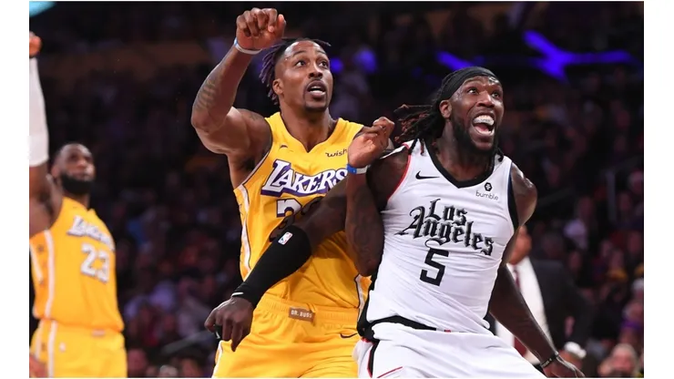 Montrezl Harrell boxing out Dwight Howard. (Getty)