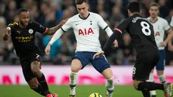 Giovani Lo Celso of Tottenham Hotspur (centre) and lkay Gundogan (right) and Raheem Sterling (left) of Manchester City. (Getty)