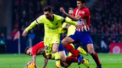 Lionel Messi of FC Barcelona (left) in action during the La Liga match between Atletico Madrid and Barcelona. (Getty)
