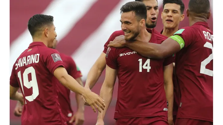 Luis Mago (center) celebrates after scoring Venezuela's first goal against Chile. (Getty)