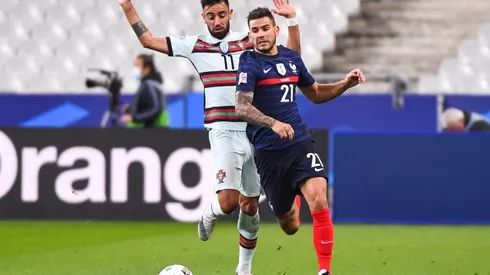 Bruno Fernandes of Portugal (left) and Lucas Hernandez of France (right). (Getty)