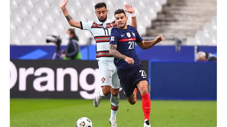 Bruno Fernandes of Portugal (left) and Lucas Hernandez of France (right). (Getty)