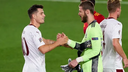 David de Gea of Spain (left) salutes with Granit Xhaka of Switzerland (right). (Getty)