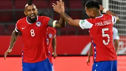 Arturo Vidal of Chile celebrates with teammate Paulo Díaz after scoring against Peru (Getty).