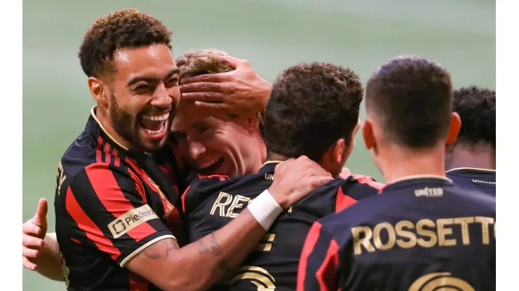 Jake Mulraney (left) celebrates after Jon Gallagher of Atlanta United scored a goal (Getty).