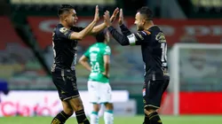 José Ramírez of León celebrates with Luis Montes after scoring his team's second goal against Santos Laguna (Getty).